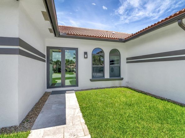 10099 Canoe Brook Circle, Boca Raton FL 33498