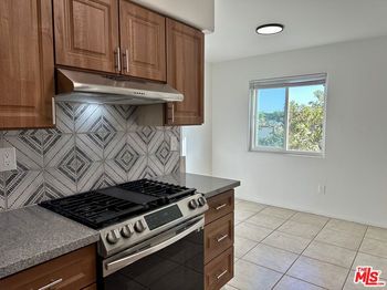 8110 S San Pedro Street