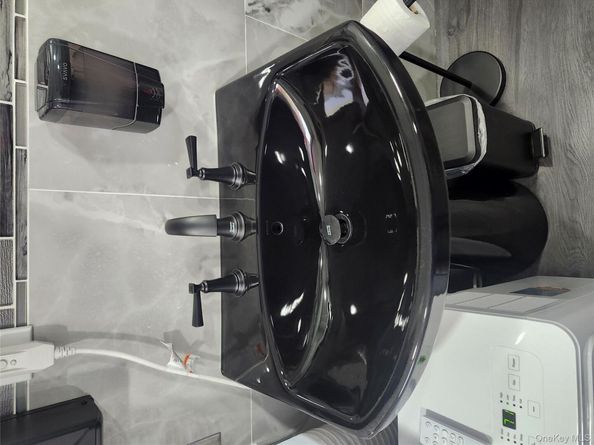 3 Brook Lane, Levittown NY 11756