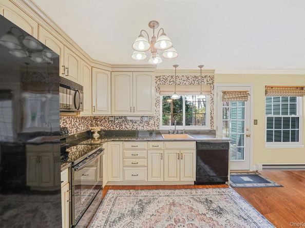 202 Belfast Lane, Ridge NY 11961