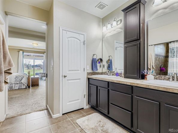 5128 Lisbon Way, Denver CO 80249