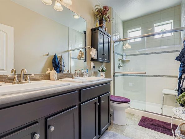 5128 Lisbon Way, Denver CO 80249