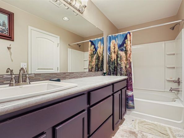 5128 Lisbon Way, Denver CO 80249