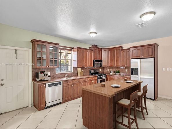 279 NW 119th Ave., Miami FL 33182