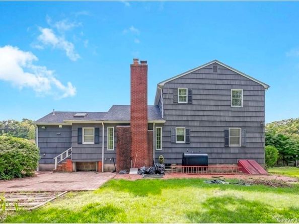 9 Half Moon Pond Road, Ridge NY 11961