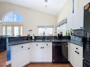 7040 Peninsula Lake Court, Lake Worth FL 33467