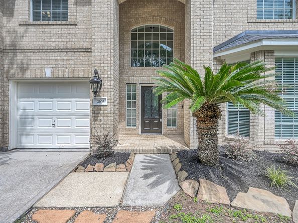 2103 Winding Hollow Court, Conroe TX 77385
