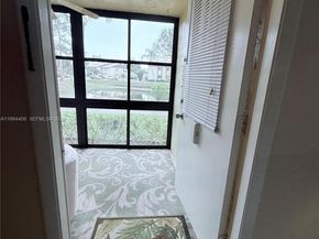 340 Pine Ridge Cir C1, Green Acres FL 33463
