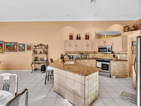 900 Spoonbill Cir, Weston FL 33326