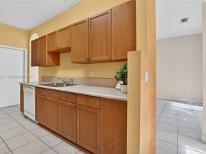 445 Rainbow Springs Ter, Royal Palm Beach FL 33411