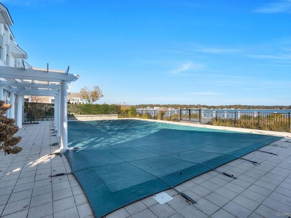 62 Canoe Place Road 513/5, Hampton Bays NY 11946