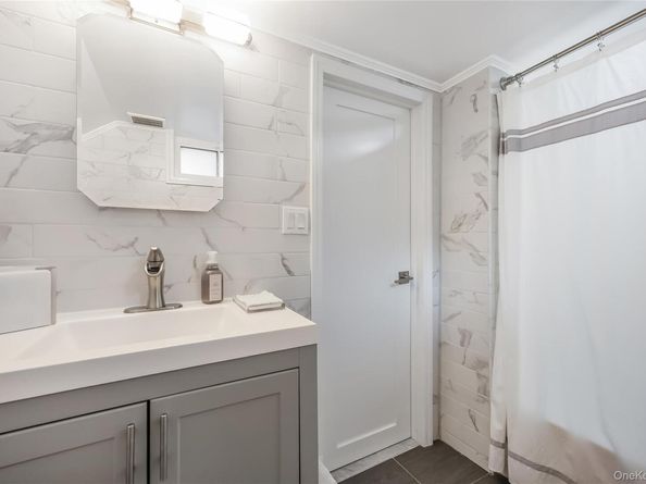 64-83 83rd Place, Middle Village NY 11379