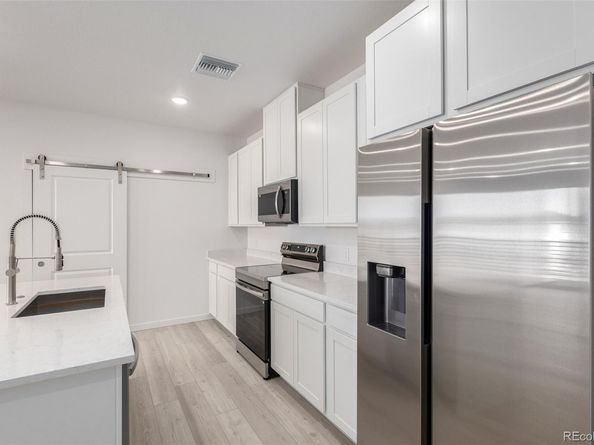 6153 N Ceylon Street 303, Denver CO 80249