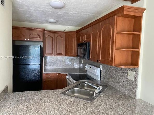 494 NW 165th St Rd C303, Miami FL 33169