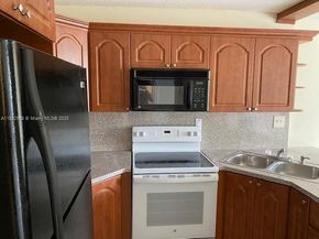 494 NW 165th St Rd C303, Miami FL 33169