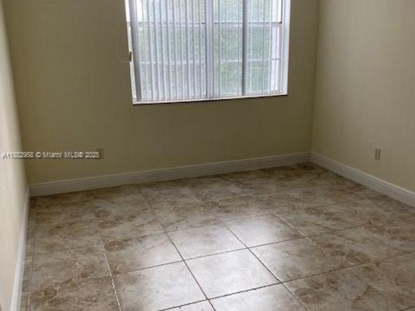 494 NW 165th St Rd C303, Miami FL 33169