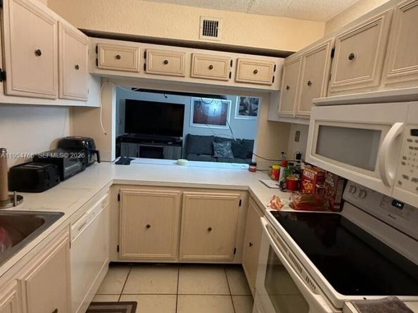 9441 Live Oak Pl 209, Davie FL 33324