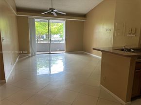 731 Lyons Rd 16203, Coconut Creek FL 33063