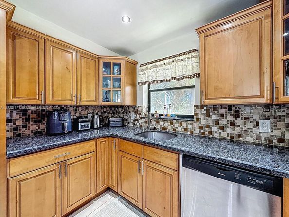 16475 Golf Club Rd 202, Weston FL 33326