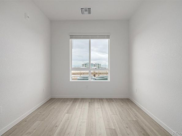 6153 N Ceylon Street 108, Denver CO 80249