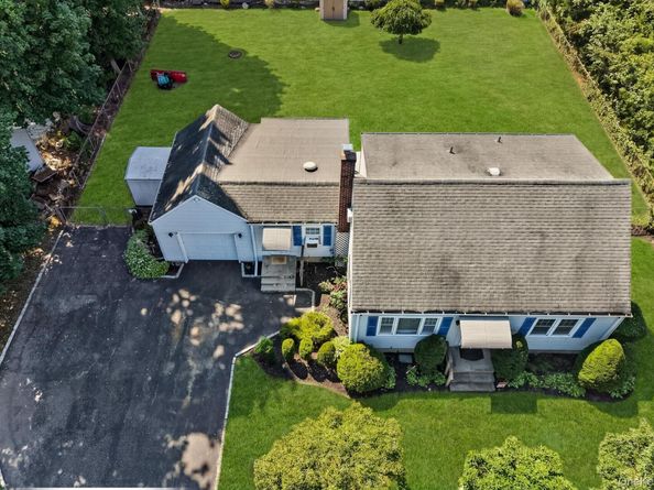 1547 Walt Whitman Road, Melville NY 11747