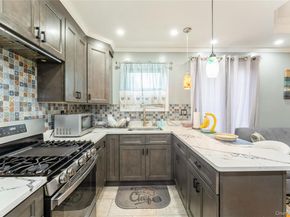 102-15 85th Drive, Richmond Hill NY 11418