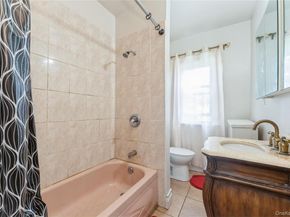 102-15 85th Drive, Richmond Hill NY 11418