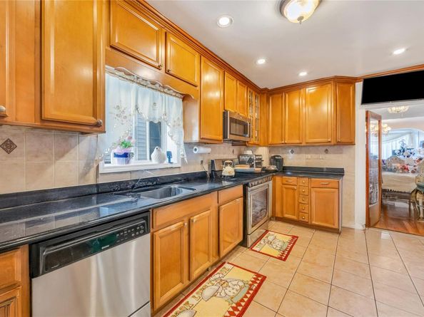 9407 Pitkin Avenue, Ozone Park NY 11417
