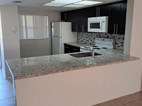 104 Palm Beach Trace Drive, Royal Palm Beach FL 33411