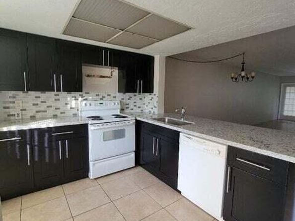 104 Palm Beach Trace Drive, Royal Palm Beach FL 33411