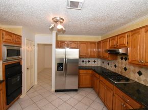 9007 Woodleigh Drive, Houston TX 77083