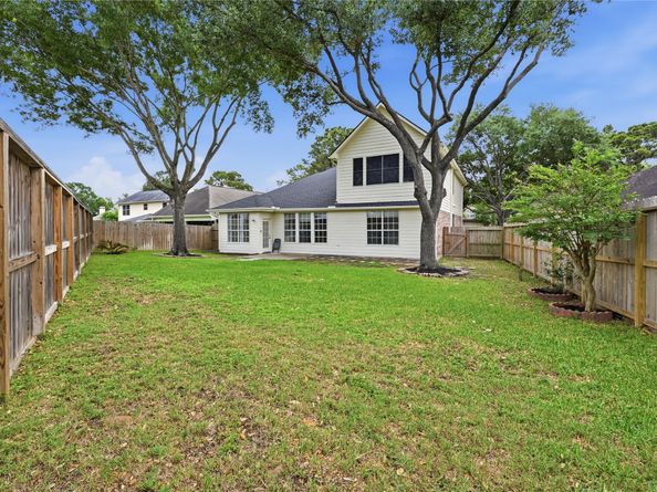 18010 Quiet Stream Court, Houston TX 77095