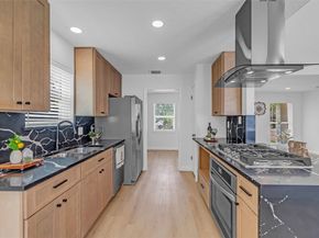 9607 Kemp Forest Drive, Houston TX 77080