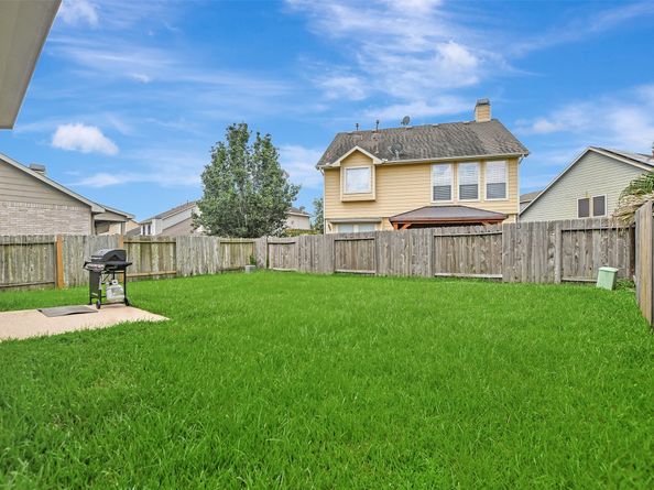 9747 Wheaton Edge Lane, Houston TX 77095
