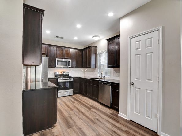 9747 Wheaton Edge Lane, Houston TX 77095