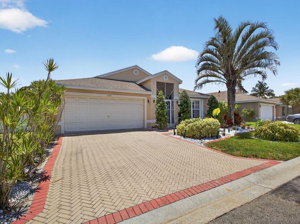 1768 Sawgrass Circle, Greenacres FL 33413
