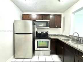 484 NW 165th St Road A411, Miami FL 33169