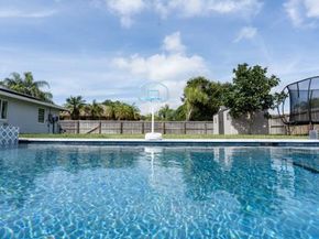 351 La Mancha Avenue, Royal Palm Beach FL 33411