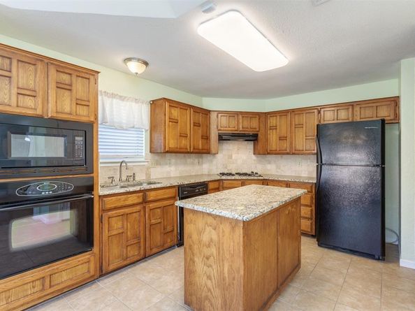 9410  Chimneywood Drive , Rowlett Texas 75089