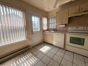 379 Larchmont Court 379, Ridge NY 11961