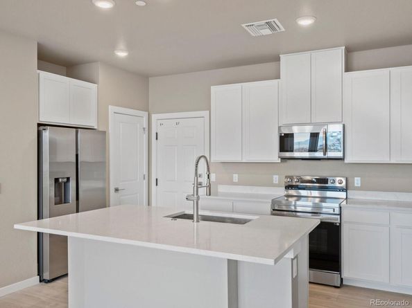 6153 N Ceylon Street 102, Denver CO 80249