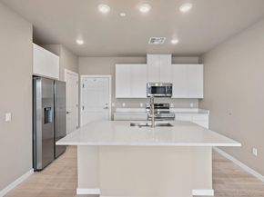 6153 N Ceylon Street 102, Denver CO 80249