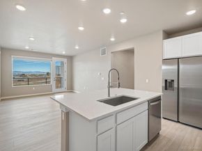 6153 N Ceylon Street 102, Denver CO 80249