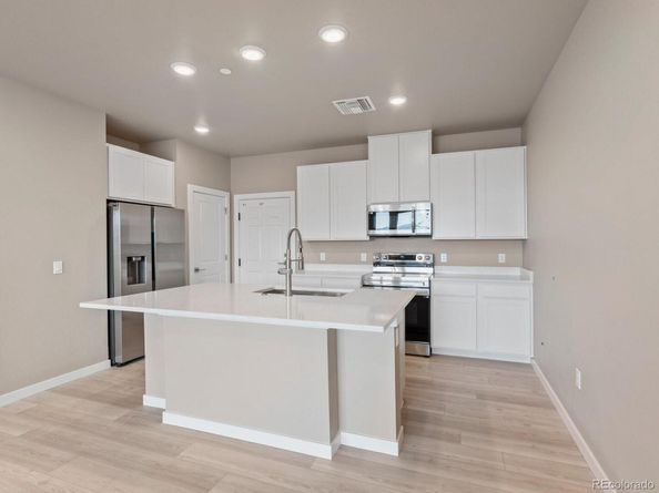 6153 N Ceylon Street 102, Denver CO 80249