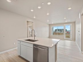 6153 N Ceylon Street 102, Denver CO 80249