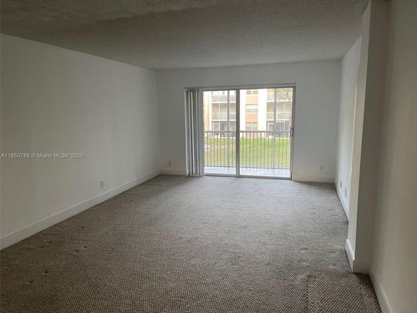 1075 Riverside Dr 203, Coral Springs FL 33071