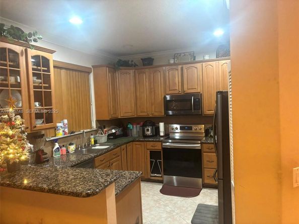 12425 NW 54th Ct, Coral Springs FL 33076