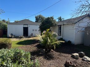 4041 Denker, Los Angeles CA 90062