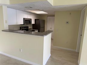 5061 Wiles Rd 202, Coconut Creek FL 33073