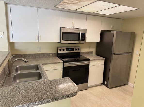5061 Wiles Rd 202, Coconut Creek FL 33073